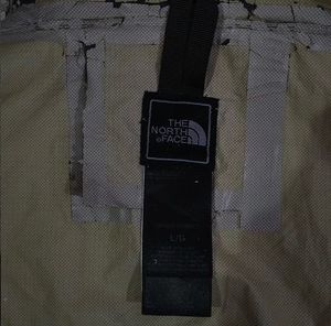 THE NORTH FACE YELLOW AND BLACK JACKET