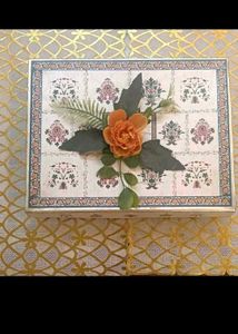 10. Decorative Gift Box with Floral Accent