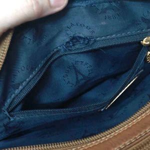 100% leather alfred snug crossbody bag