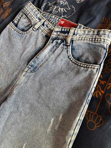 Ripped Light Wash Denim Jeans