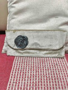 Elegant Clutch with Flower Detail