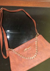 BROWN CHAINED SLING BAG