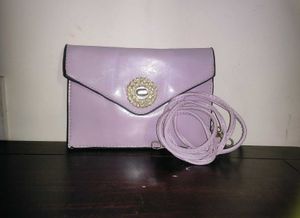 Sling Bag with Detachable Strap.