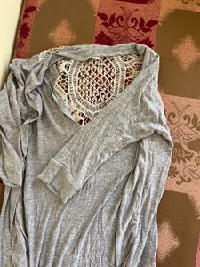 Gray long sleeve top with crochet detail