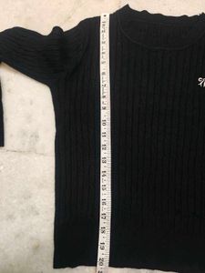 Chic Black Cable Knit Sweater with Bow Detail