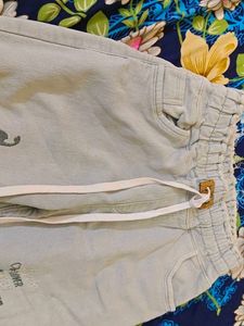Stylish Light Blue Jeans with Fun Graphics