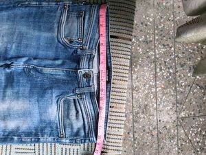 Light Blue Distressed Denim Jeans