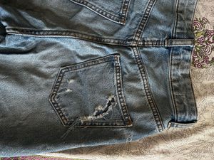 Women’s Blue Distressed Jeans – Size 26