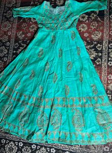 Beautiful Teal Ethnic Gown with Gold Print know an