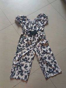 Chic Floral Jumpsuit with Bow Detail