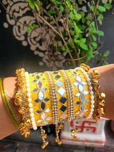 Yellow Embellished Bangles with Charms