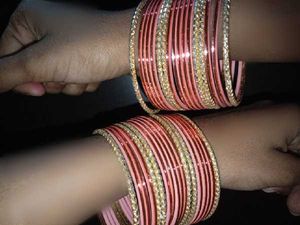 set of 2 Gold Toned Bangles with Gemstones