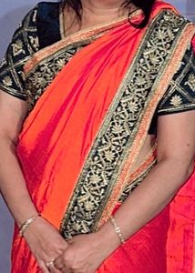 Elegant Orange Saree with Embellished Blouse