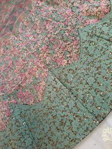Embroidered lehenga with blouse and dupatta