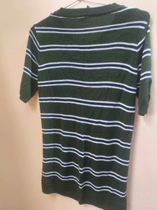 An olive green Sweater top