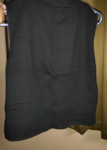Sleeveless Black High Neck Top