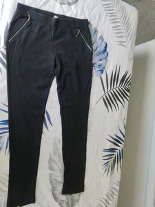 Chic Black Pants with Gold Zippers