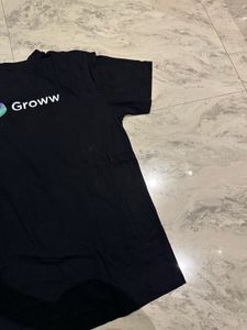 Black "You look invested." T-Shirt