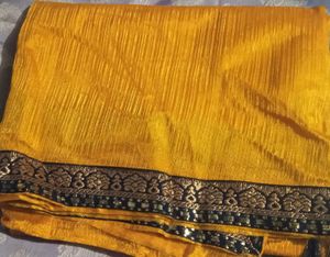 Elegant Yellow Saree with Embellished Border