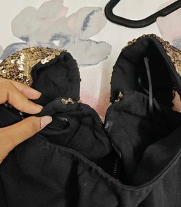 Chic Black Dress with Sequined Shoulders