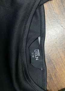 Sleek Black Spaghetti Strap Camisole