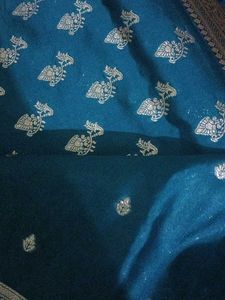 Elegant Teal Saree with Gold Brocade