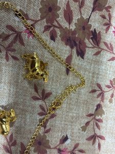 Gold-tone Nandi bell Necklace and Earring Set