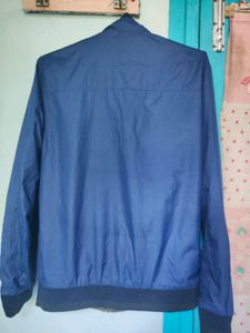 A Winter Jacket With Dual Colours. You can Use It Both Ways - Tortoise Olive And Ocean Blue.