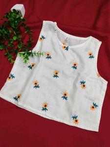 Chic White Sleeveless Top with Floral Embroidery