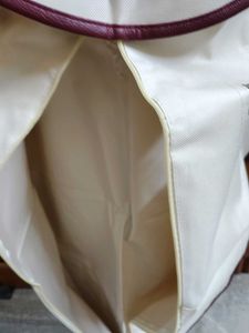 Chic Cream Handbag with Burgundy Trim
