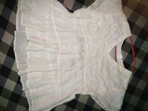 Sheer White Peplum Top with Ruffle Details