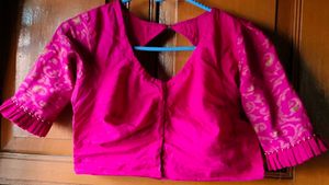 Vibrant Pink Blouse with Elegant Sleeves