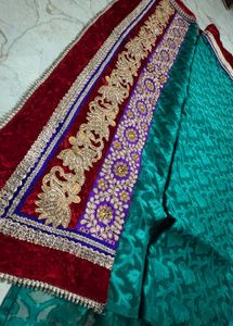 Exquisite Teal Saree with Embellished Border