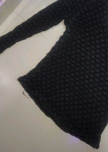 Black textured long sleeve top