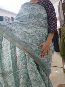 Elegant Green Saree with White Leaf Print