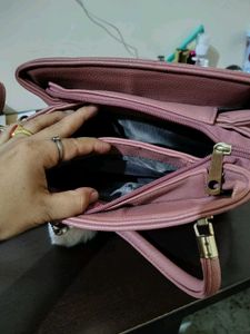 Stylish Pink Textured Handbag with Charm