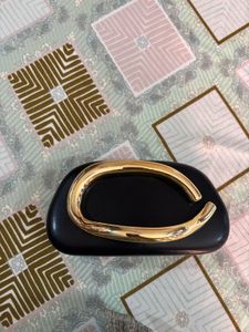 Chic Black Clutch with Gold Accent