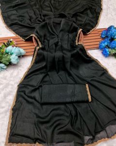 Elegant Black Saree with Gold Trim