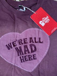 Purple "We're All Mad Here" Graphic Tee