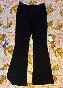 hnm black glittery flare pants