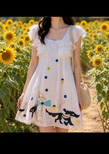 Chic White Ruffled Dress with Cartoon Applique
