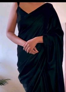 Elegant Dark Green  Saree with  Sleevless Blouse