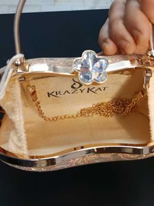 Elegant Golden Party Clutch with Crystal Lock
