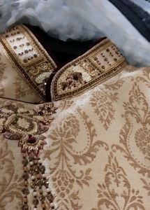 Sherwani- Golden With Maroon Highlights And Button