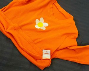 Orange Long Sleeve Cropped Top with Flower Appliqu