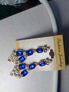 Elegant Blue and Clear Gemstone Earrings."