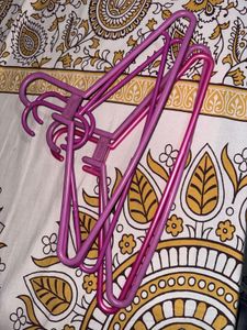 12 Pink Plastic Clothes Hangers