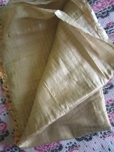 Elegant Gold Striped Fabric with Tassel Trim