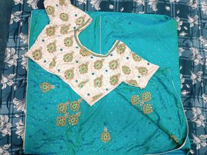 Teal Embellished saree with blouse