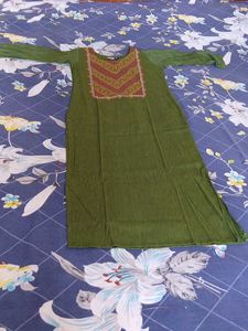 Elegant Green Kurta with Embellished Neckline